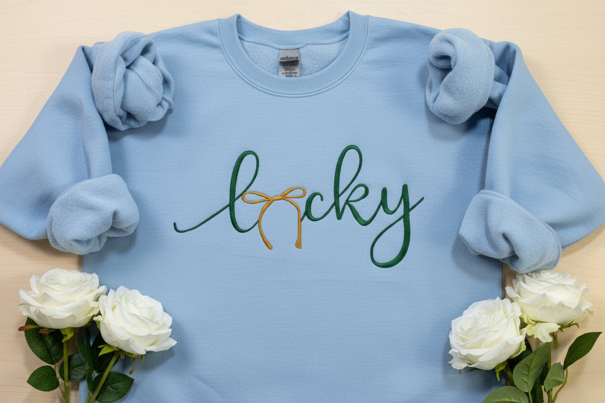 St. Patrick's Day Embroidered "LUCKY" Sweatshirt with a gold bow. Cozy & Stylish Irish Charm