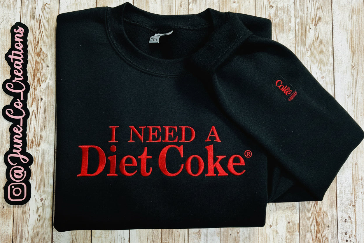 I need a Diet Coke embroidered sweatshirt. Cozy sweatshirt with a mini Diet Coke embellishment on the sleeve