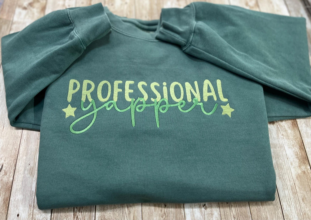 Professional Yapper. This cozy embroidered sweatshirt is perfect for the Yapper in your life.