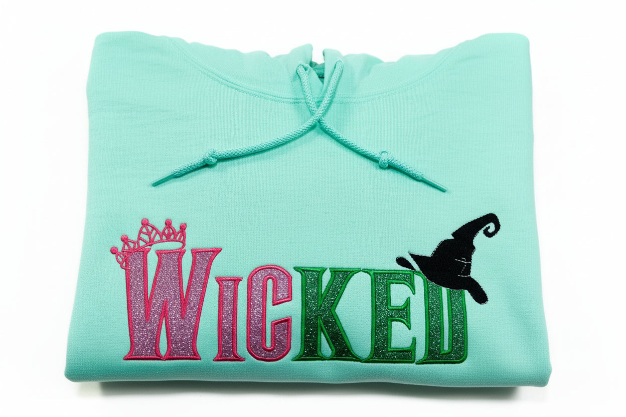 Youth WICKED! This sparkly, Wicked embroidered sweatshirt is perfect for Youth. Complete with sleeve embellishment Broom and Wand Vinyl