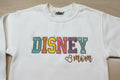 Soft and Comfy Disney Mom Embroidered Sweatshirt with Vibrant colors outlined in a Metallic Golden Thread.