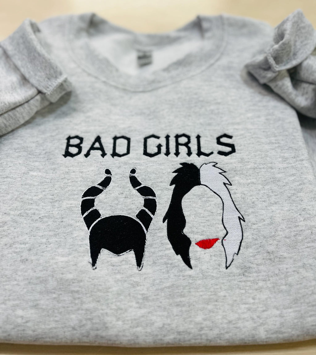 Disney villains Cruella Deville, and Maleficent “Bad Girls” sweatshirt.  Keeps you warm this fall season.