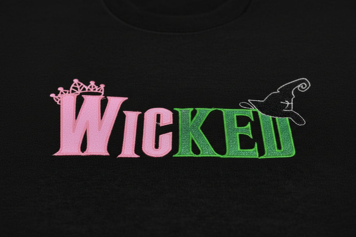 Youth WICKED! This sparkly, Wicked embroidered sweatshirt is perfect for Youth. Complete with sleeve embellishment Broom and Wand Vinyl