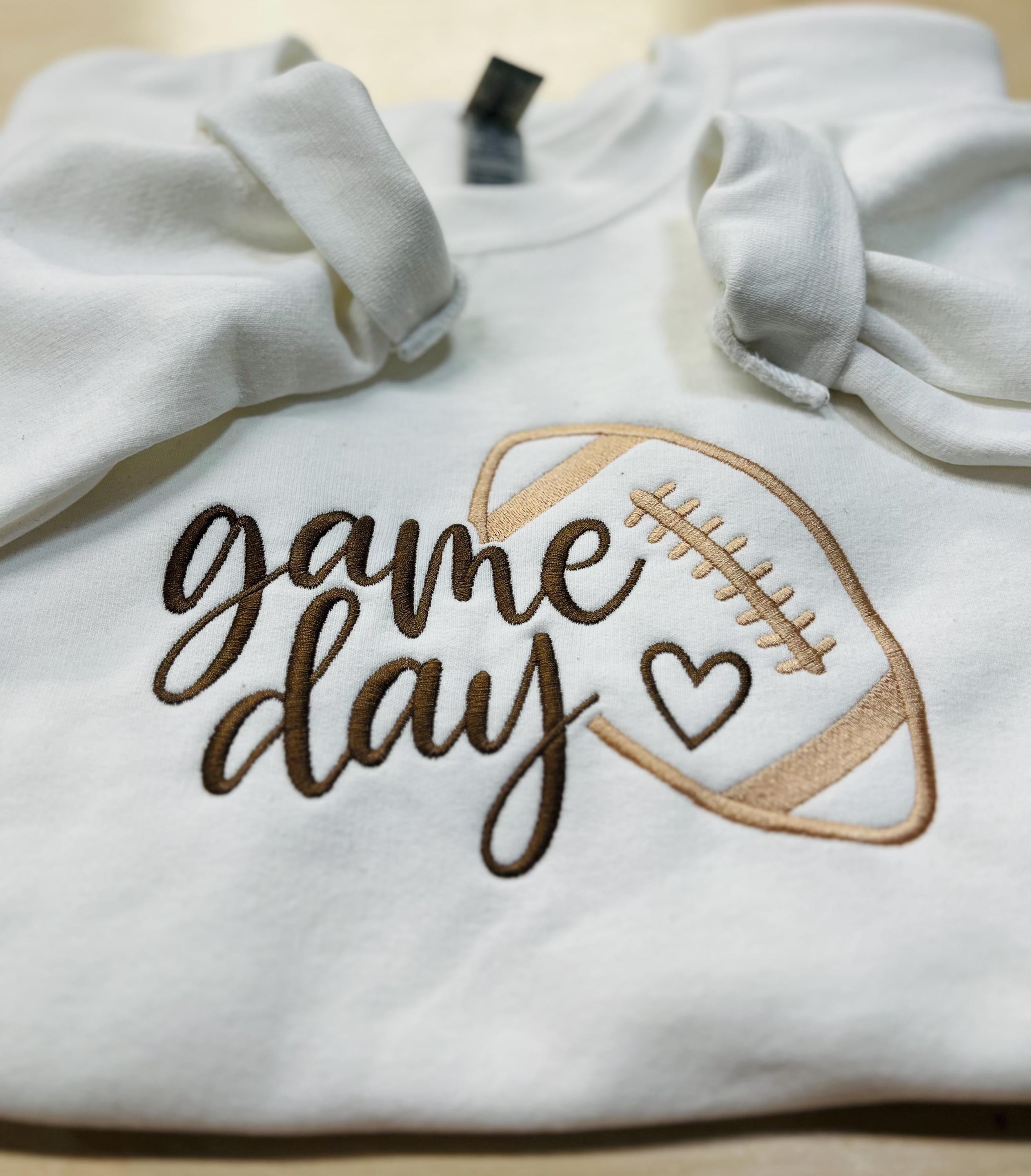 Football “Game Day” Embroidered Sweatshirt. Cozy, and soft. Keeps you warm and cozy this fall season.