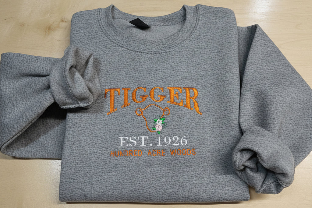 Tigger Soft & Cozy Embroidered Sweatshirt. Beautifully designed featuring Hundred Acre Woods.