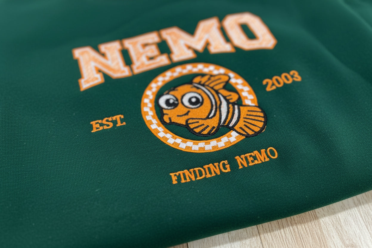 NEMO! Finding Nemo embroidered sweatshirt. For those Disney Nemo fans. This Vibrant sweatshirt is adorable.