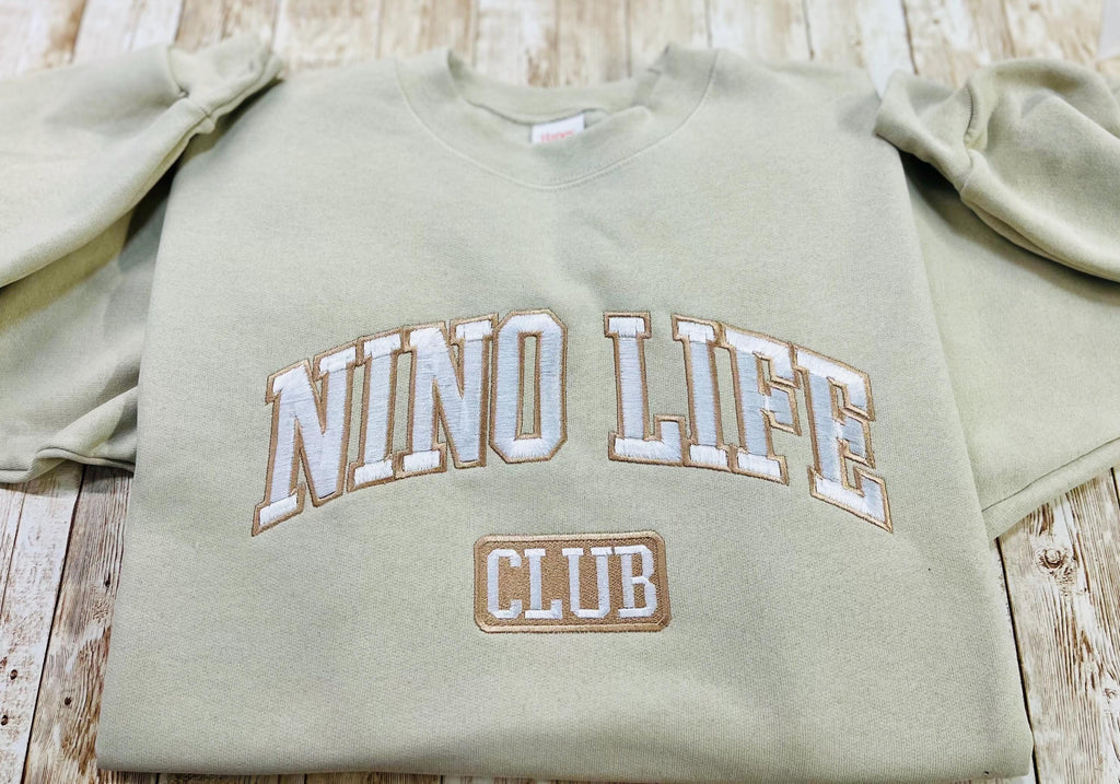 Nino! Nino Life Club embroidered soft and cozy sweatshirt. Perfect for your favorite Nino