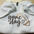 Football “Game Day” Embroidered Sweatshirt. Cozy, and soft. Keeps you warm and cozy this fall season.