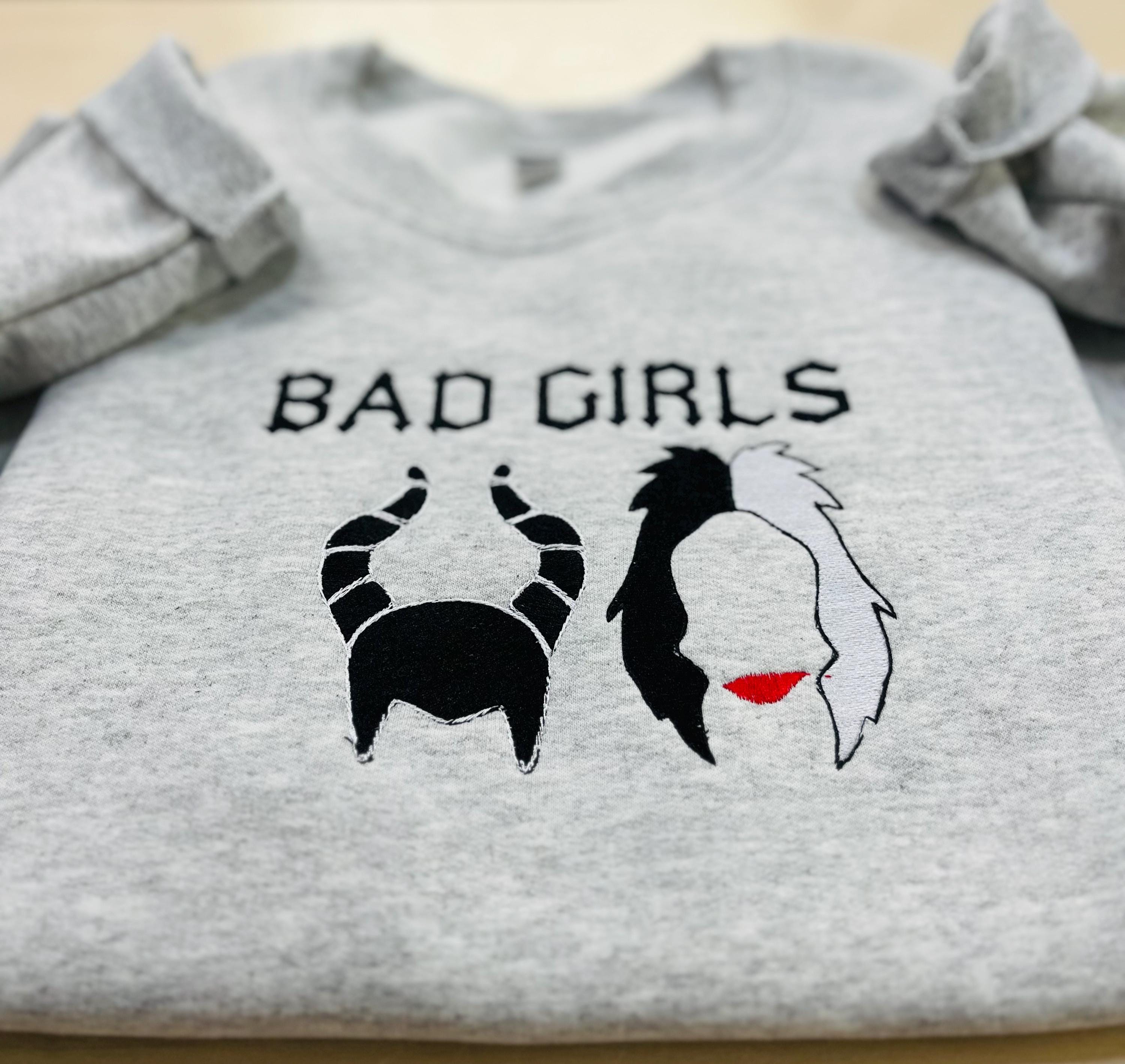 Disney villains Cruella Deville, and Maleficent “Bad Girls” sweatshirt.  Keeps you warm this fall season.