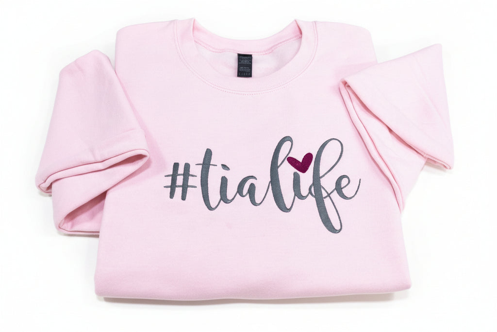 The best Tia!  #TiaLife embroidered soft and cozy sweatshirt. Perfect for your favorite Tia. Treat yourself or great for a unique gift