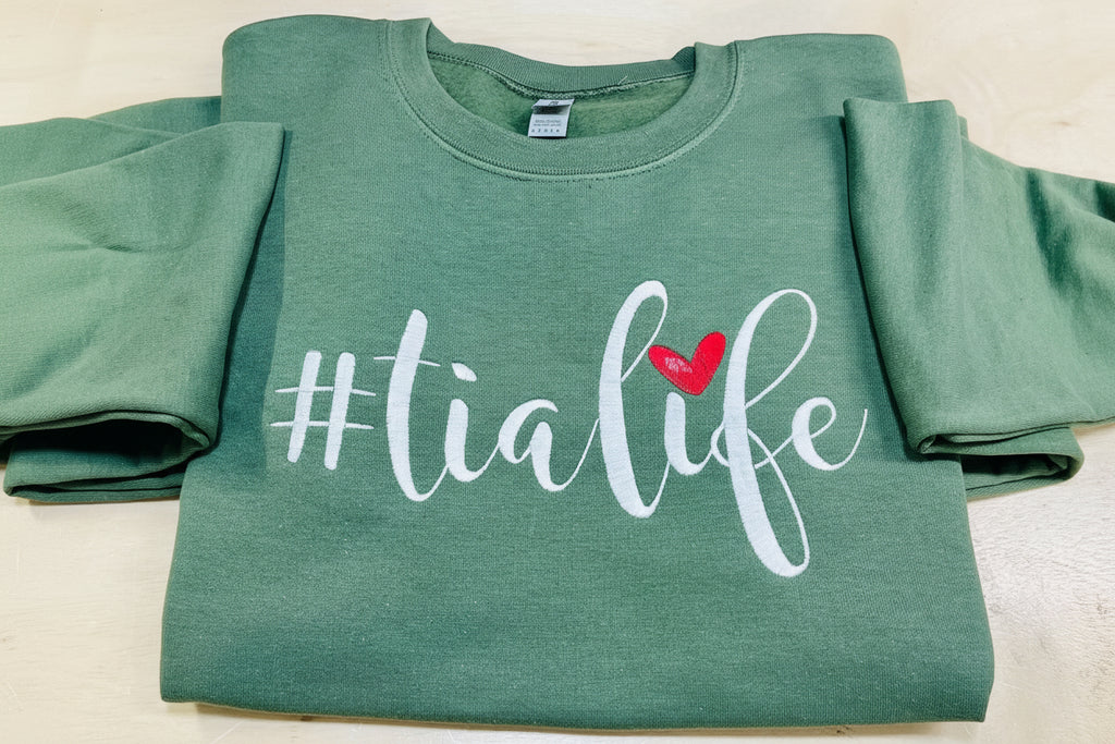 The best Tia!  #TiaLife embroidered soft and cozy sweatshirt. Perfect for your favorite Tia. Treat yourself or great for a unique gift