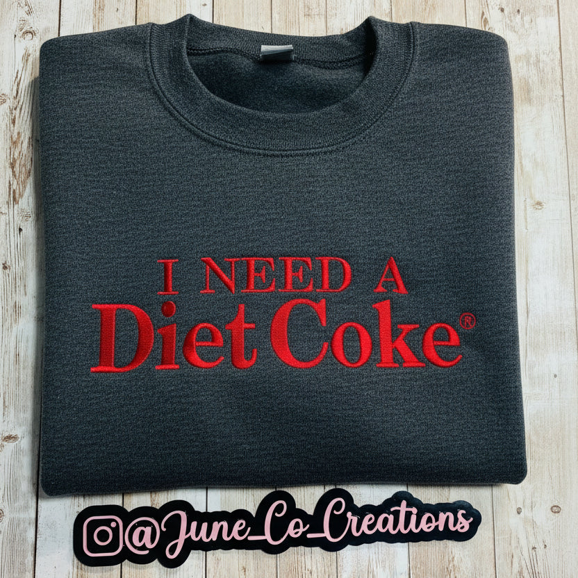 I need a Diet Coke embroidered sweatshirt. Cozy sweatshirt with a mini Diet Coke embellishment on the sleeve
