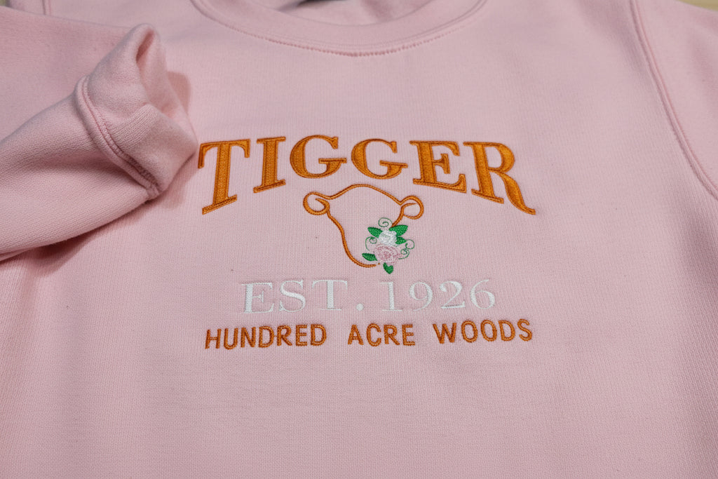Tigger Soft & Cozy Embroidered Sweatshirt. Beautifully designed featuring Hundred Acre Woods.