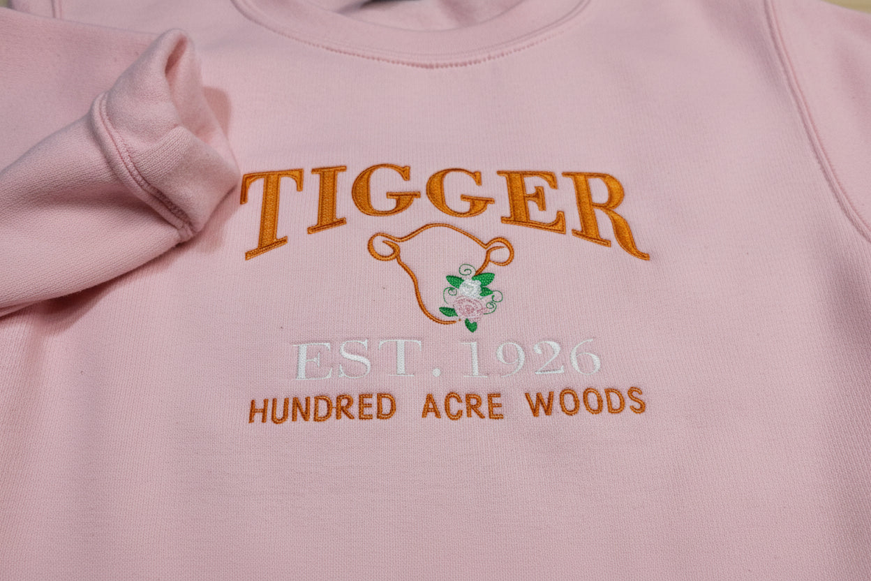 Tigger Soft & Cozy Embroidered Sweatshirt. Beautifully designed featuring Hundred Acre Woods.