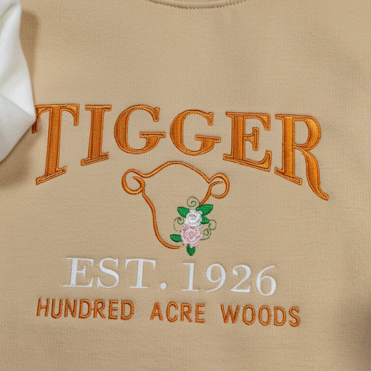 Tigger Soft & Cozy Embroidered Sweatshirt. Beautifully designed featuring Hundred Acre Woods.