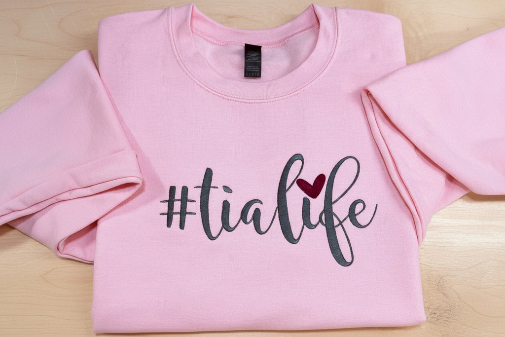The best Tia!  #TiaLife embroidered soft and cozy sweatshirt. Perfect for your favorite Tia. Treat yourself or great for a unique gift