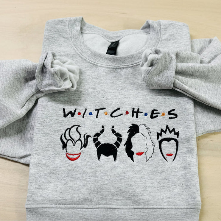 WITCHES Halloween Villain featuring Cruella De Vil, Maleficent, Evil Queen, Ursula. Soft and cozy embroidered Sweatshirt