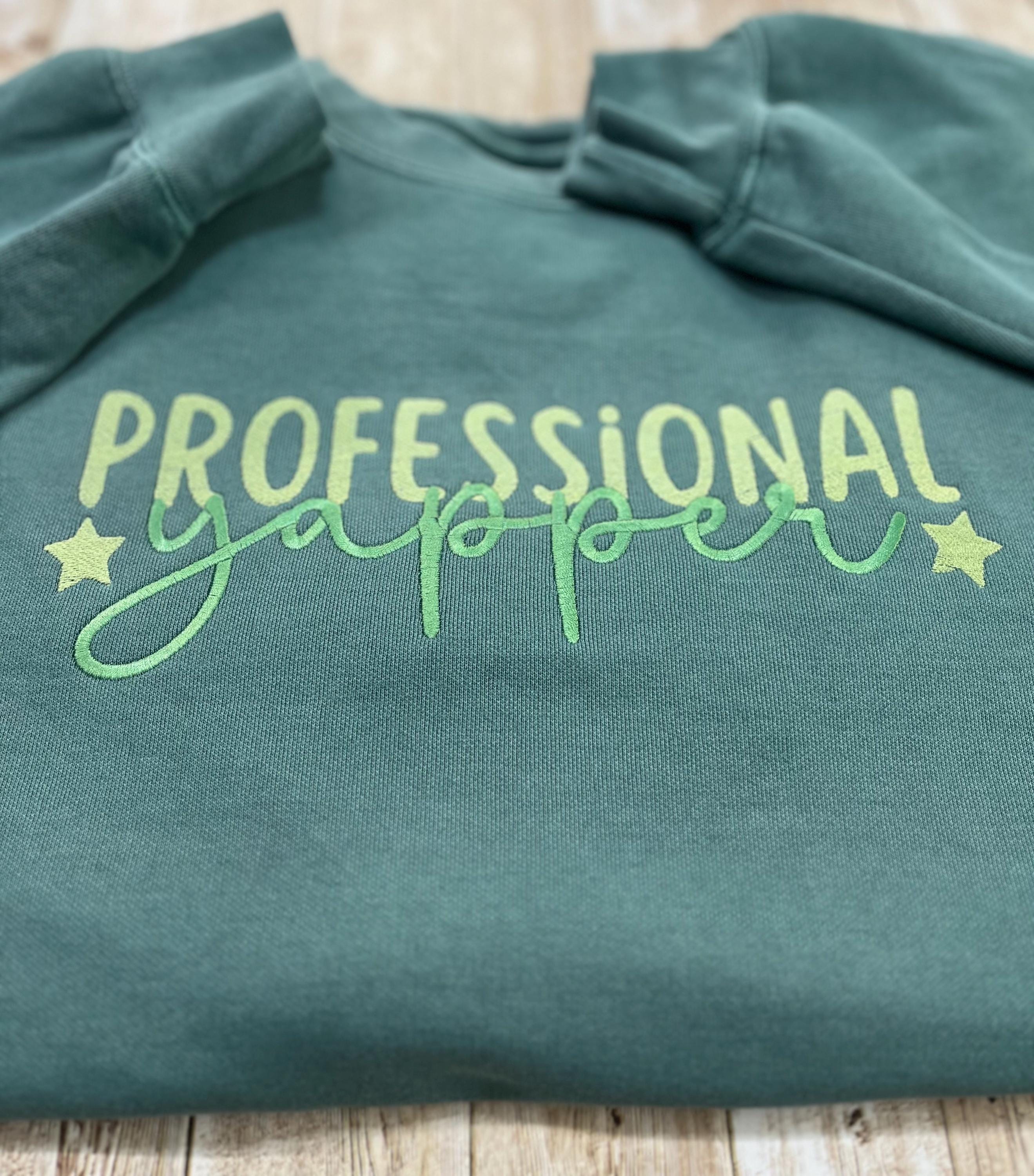 Professional Yapper. This cozy embroidered sweatshirt is perfect for the Yapper in your life.