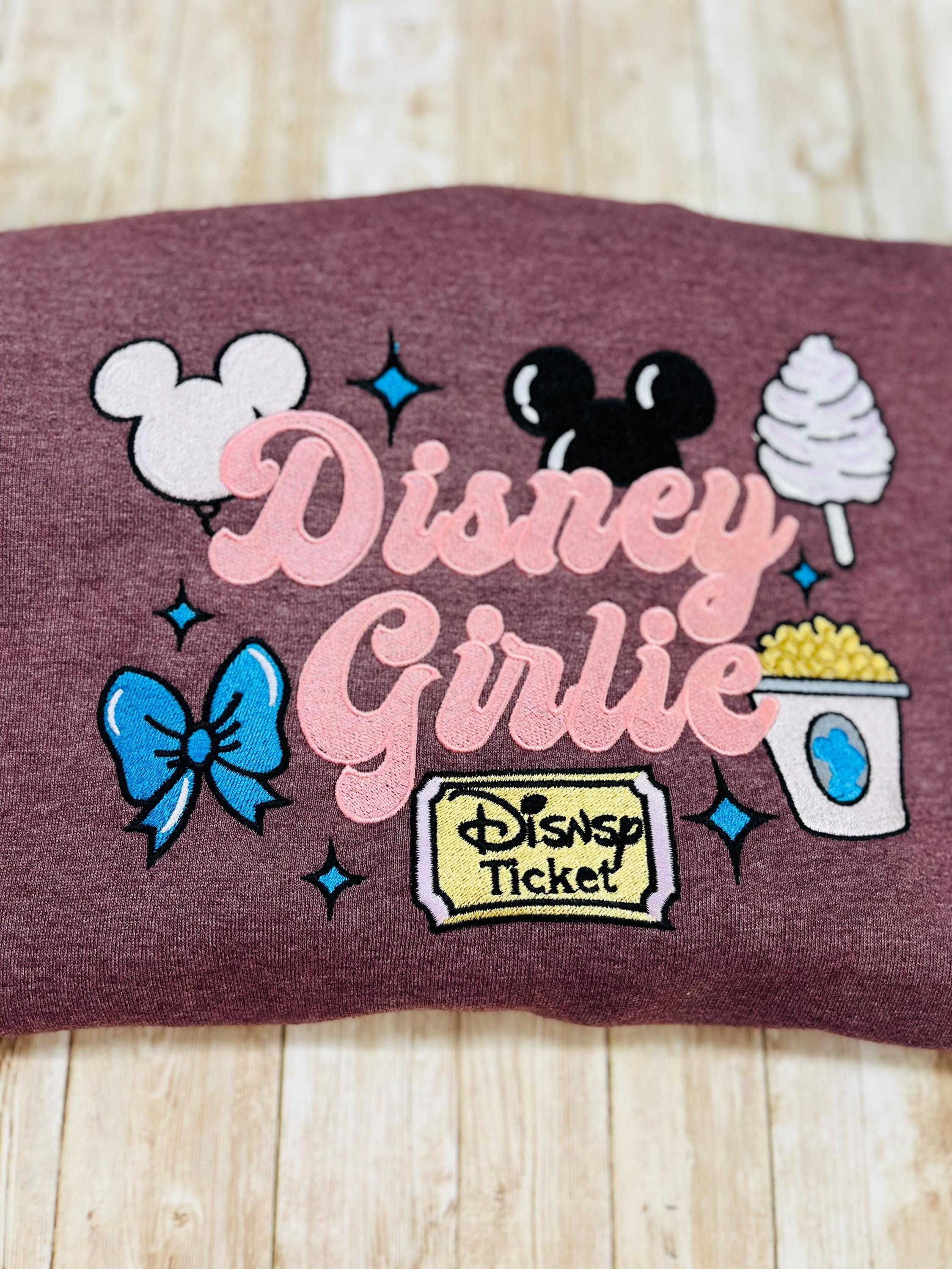 Disney girlie. Cozy embroidered Sweatshirt with sleeve embellishments. Featuring Disney classic icons. All the things you love Disney.