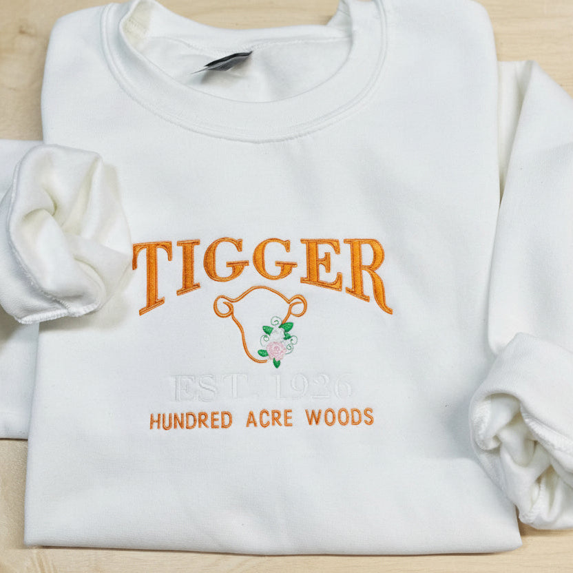 Tigger Soft & Cozy Embroidered Sweatshirt. Beautifully designed featuring Hundred Acre Woods.