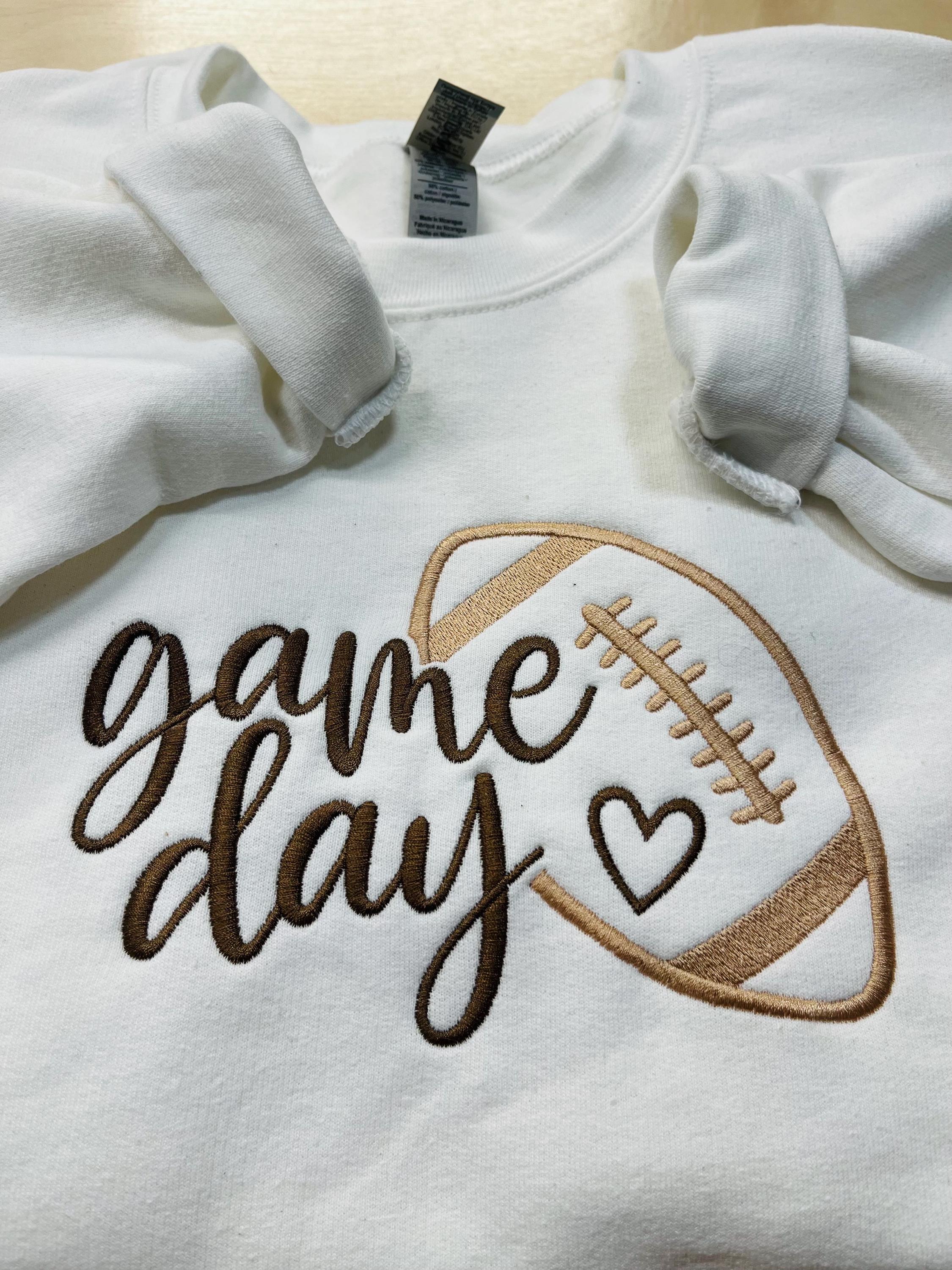 Football “Game Day” Embroidered Sweatshirt. Cozy, and soft. Keeps you warm and cozy this fall season.