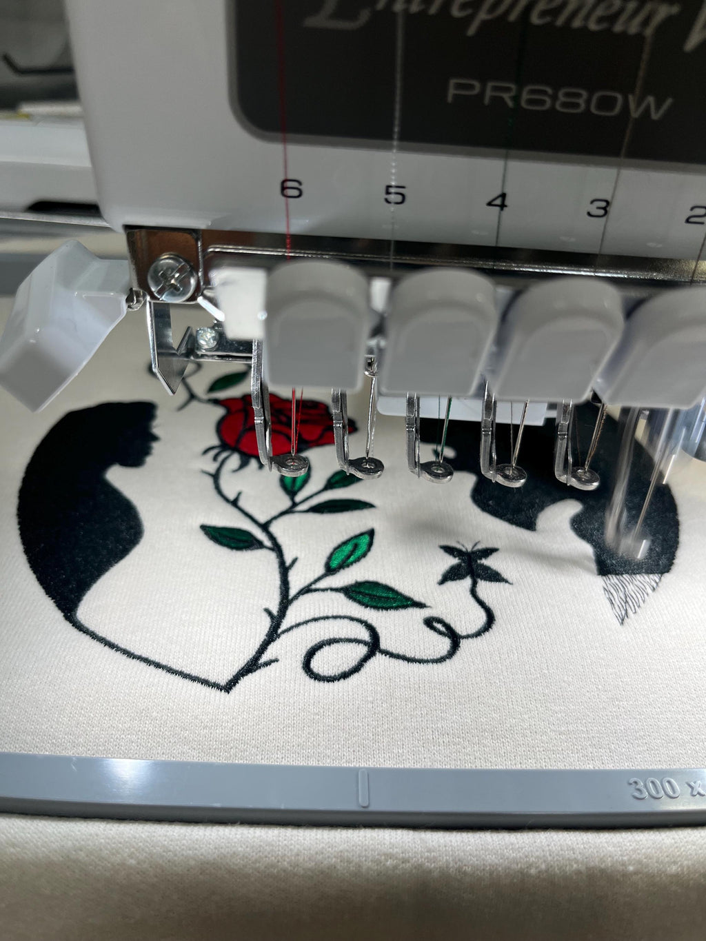 Beauty and the Beast. Cozy embroidered Sweatshirt with sleeve embellishments. A Disney classic fairytale. Featuring the famous Rose.