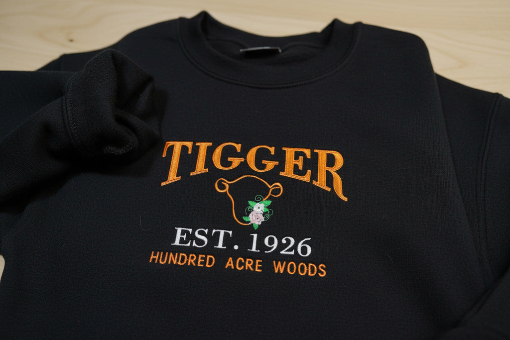 Tigger Soft & Cozy Embroidered Sweatshirt. Beautifully designed featuring Hundred Acre Woods.