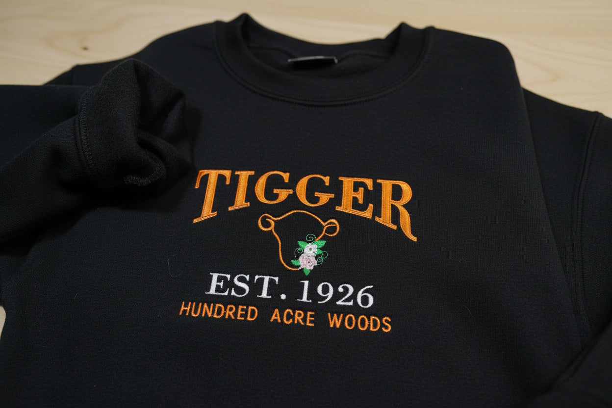 Tigger Soft & Cozy Embroidered Sweatshirt. Beautifully designed featuring Hundred Acre Woods.