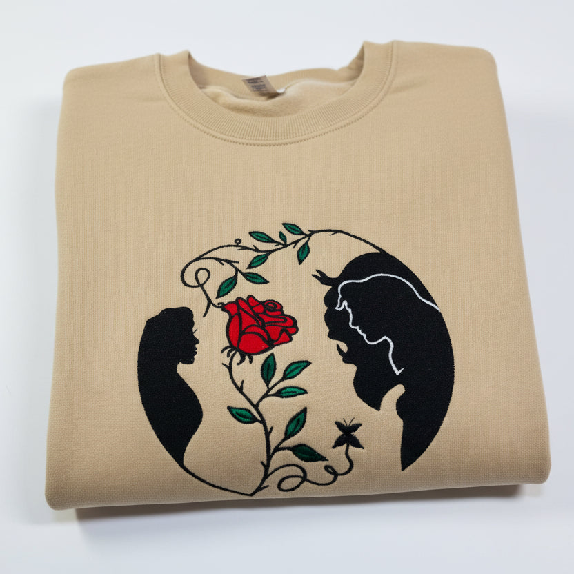 Beauty and the Beast. Cozy embroidered Sweatshirt with sleeve embellishments. A Disney classic fairytale. Featuring the famous Rose.