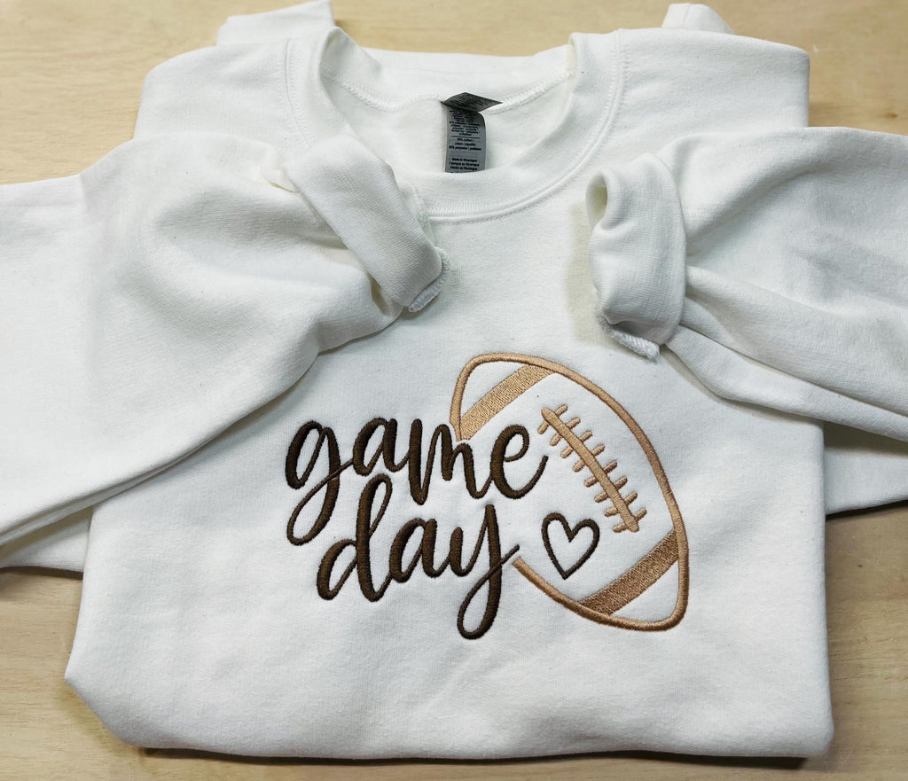 Football “Game Day” Embroidered Sweatshirt. Cozy, and soft. Keeps you warm and cozy this fall season.
