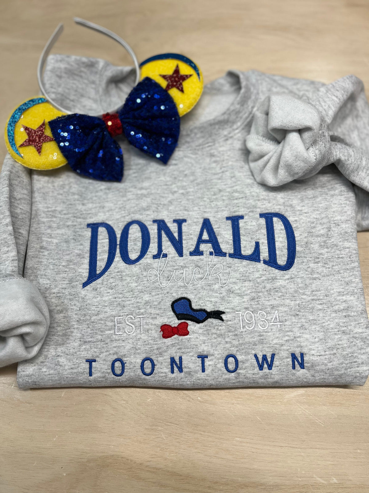 Donald Duck Embroidered Sweatshirt. Soft and Cozy stitched with vibrant colors. Famous Duck.