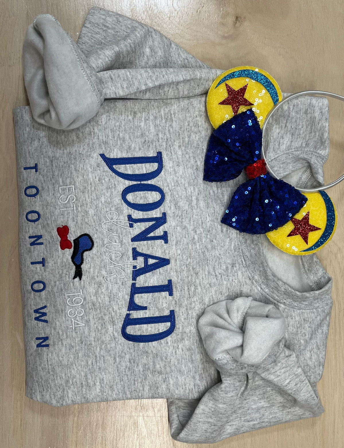 Donald Duck Embroidered Sweatshirt. Soft and Cozy stitched with vibrant colors. Famous Duck.