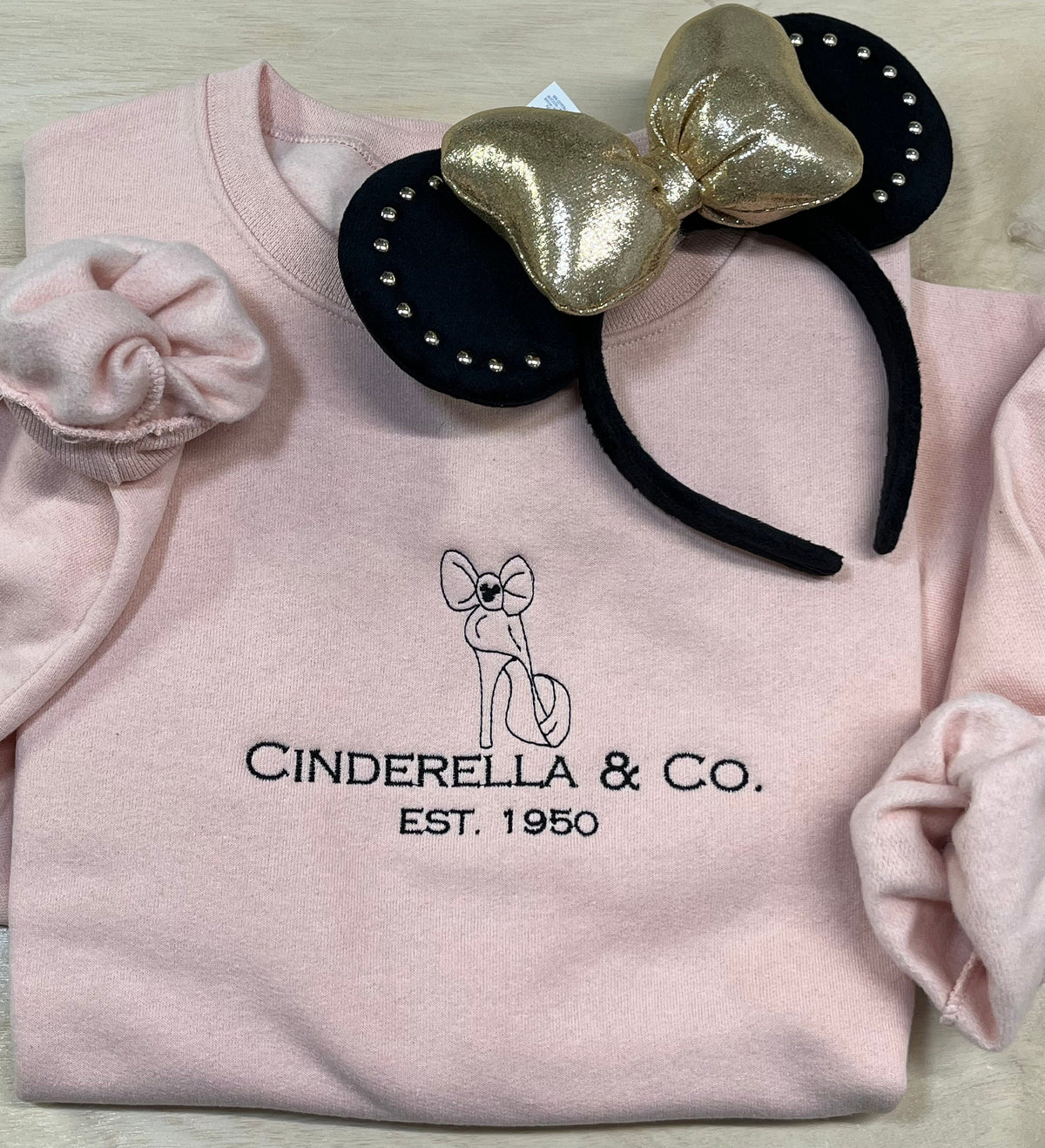 Cinderella & Co. Disney Princess cozy embroidered sweatshirt.