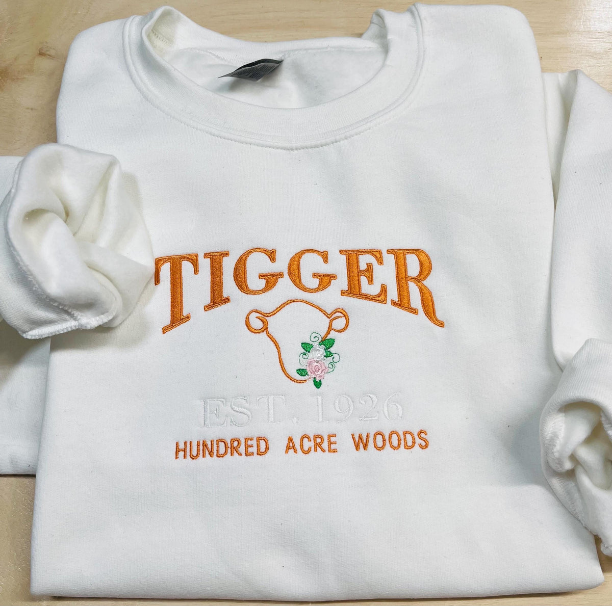 Tigger Soft & Cozy Embroidered Sweatshirt. Beautifully designed featuring Hundred Acre Woods.