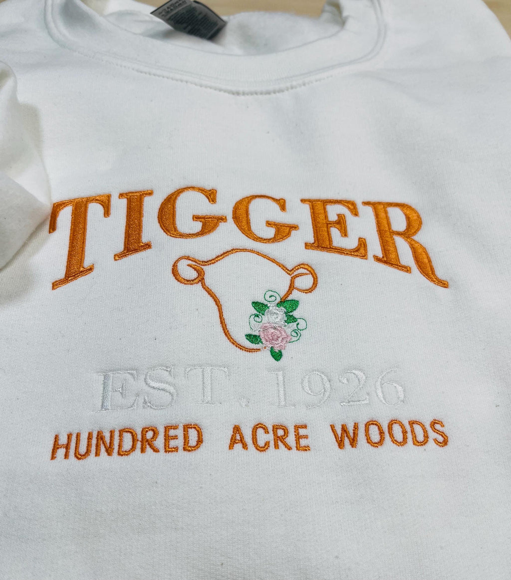 Tigger Soft & Cozy Embroidered Sweatshirt. Beautifully designed featuring Hundred Acre Woods.