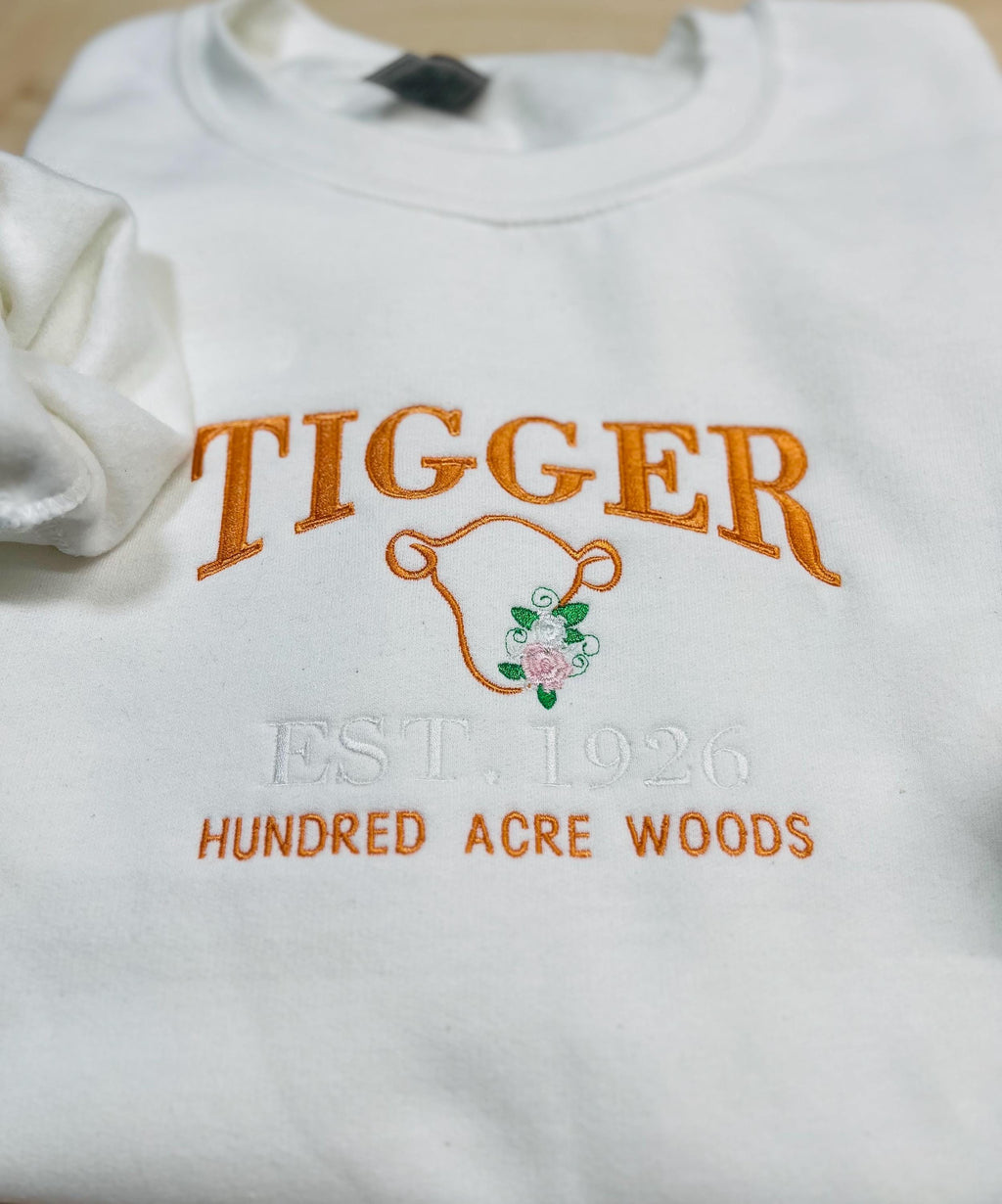 Tigger Soft & Cozy Embroidered Sweatshirt. Beautifully designed featuring Hundred Acre Woods.