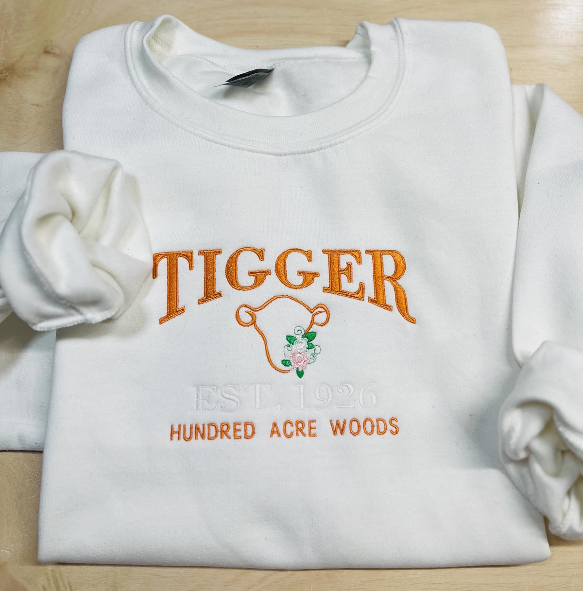 Tigger Soft & Cozy Embroidered Sweatshirt. Beautifully designed featuring Hundred Acre Woods.
