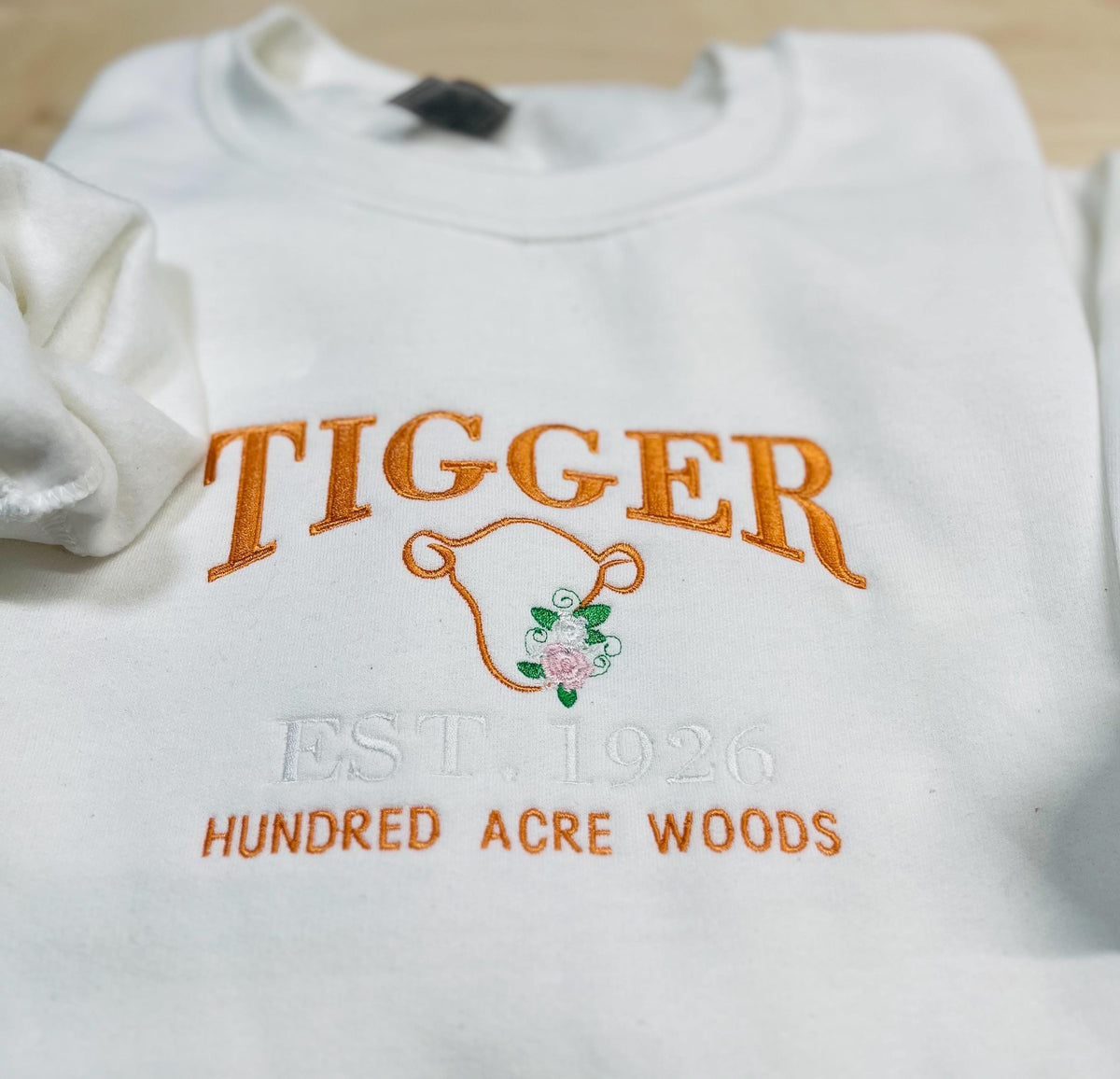 Tigger Soft & Cozy Embroidered Sweatshirt. Beautifully designed featuring Hundred Acre Woods.