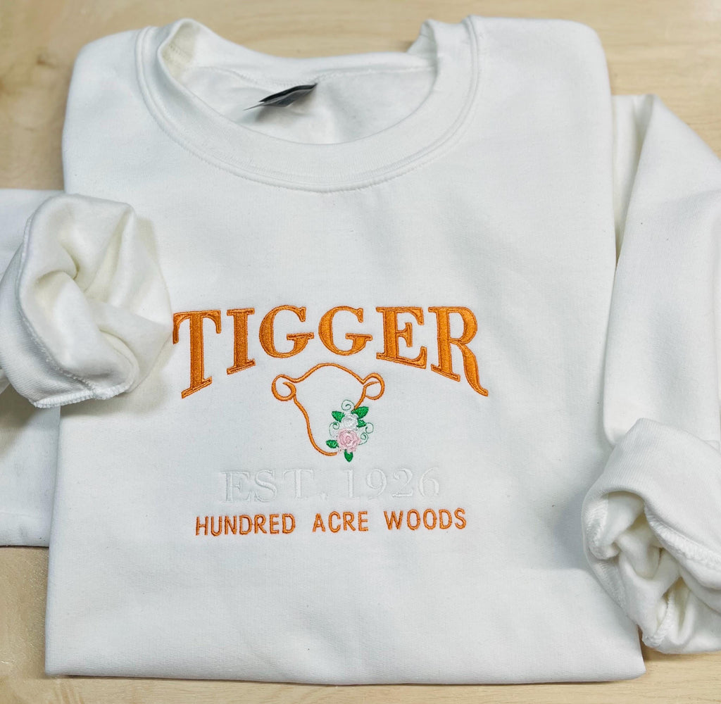 Tigger Soft & Cozy Embroidered Sweatshirt. Beautifully designed featuring Hundred Acre Woods.