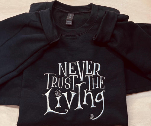 Coraline Embroidered Sweatshirt: "Never Trust The Living" Fall Apparel