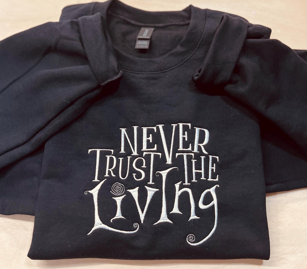 Coraline Embroidered Sweatshirt: "Never Trust The Living" Fall Apparel