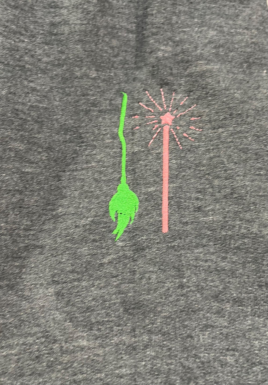 WICKED! This sparkly, embroidered wicked sweatshirt is perfect for Wicked fans. Includes a sleeve embellishment of a Green Broom/Pink Wand