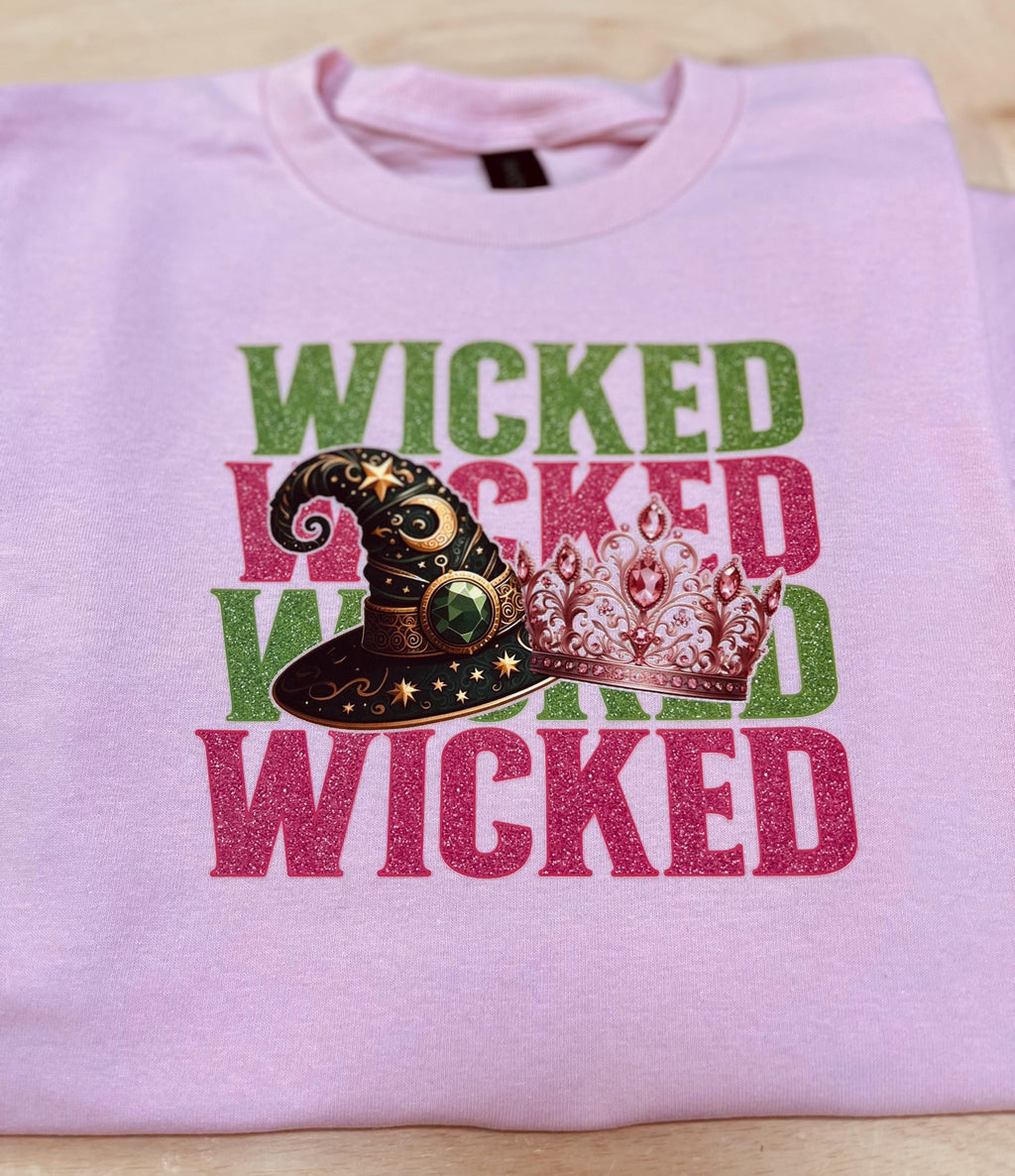 Youth WICKED! This sparkly, Wicked iron on T-Shirt is perfect for Youth. Complete with sleeve embellishment Broom and Wand Vinyl