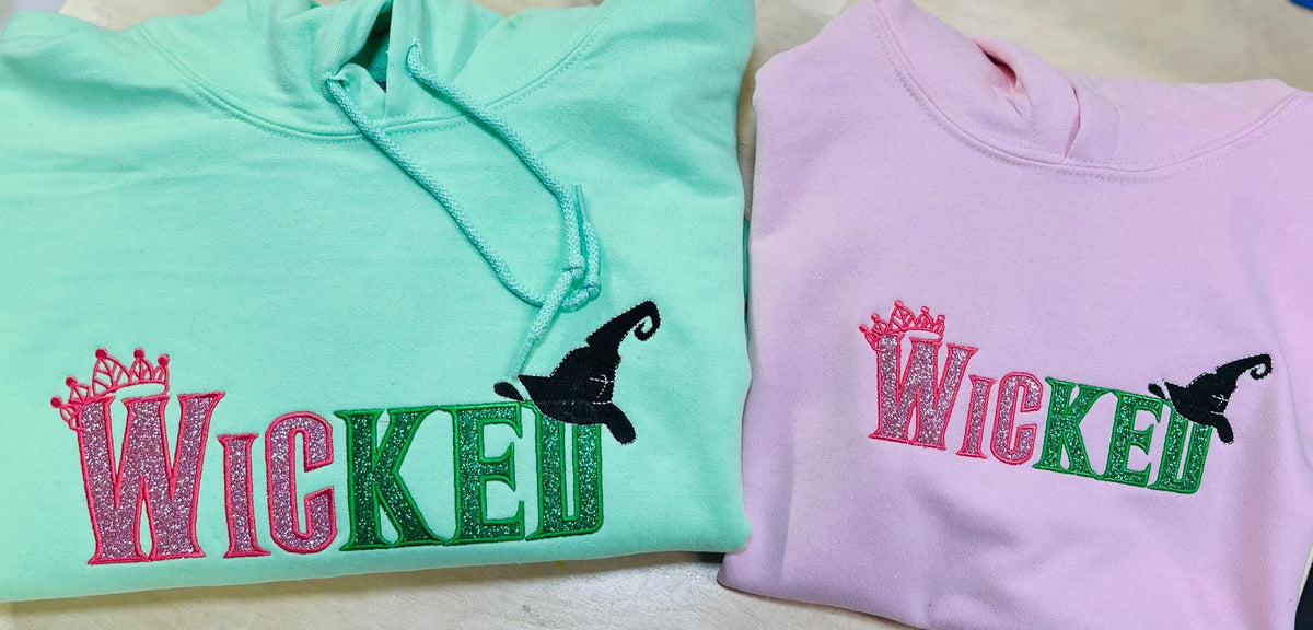 Youth WICKED! This sparkly, Wicked embroidered sweatshirt is perfect for Youth. Complete with sleeve embellishment Broom and Wand Vinyl
