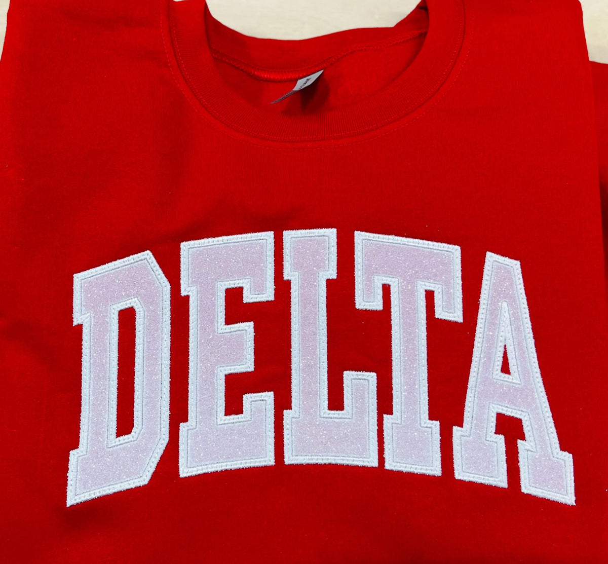Delta Theta Sigma Embroidered Sweatshirt with Sleeve Embellishments