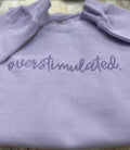 Overstimulated. This cozy embroidered sweatshirt is cozy and cute! custom made to Order using comfort colors sweatshirt