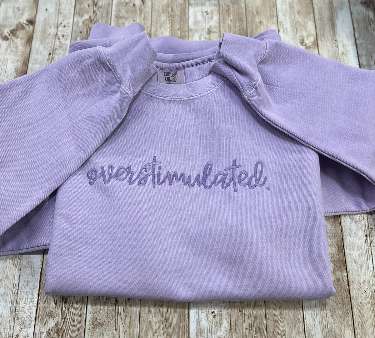 Overstimulated. This cozy embroidered sweatshirt is cozy and cute! custom made to Order using comfort colors sweatshirt