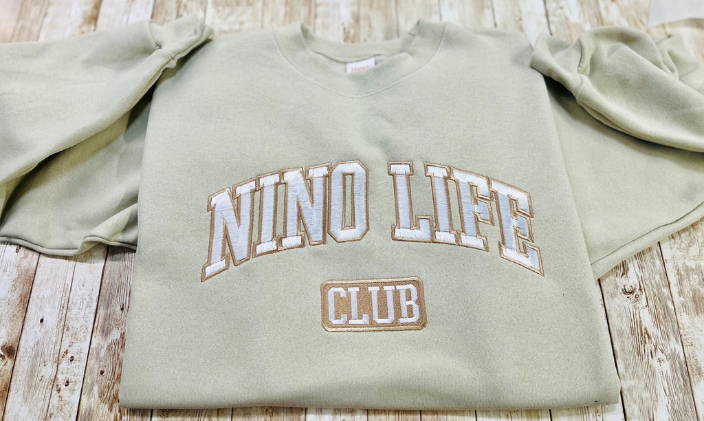 Nino! Nino Life Club embroidered soft and cozy sweatshirt. Perfect for your favorite Nino