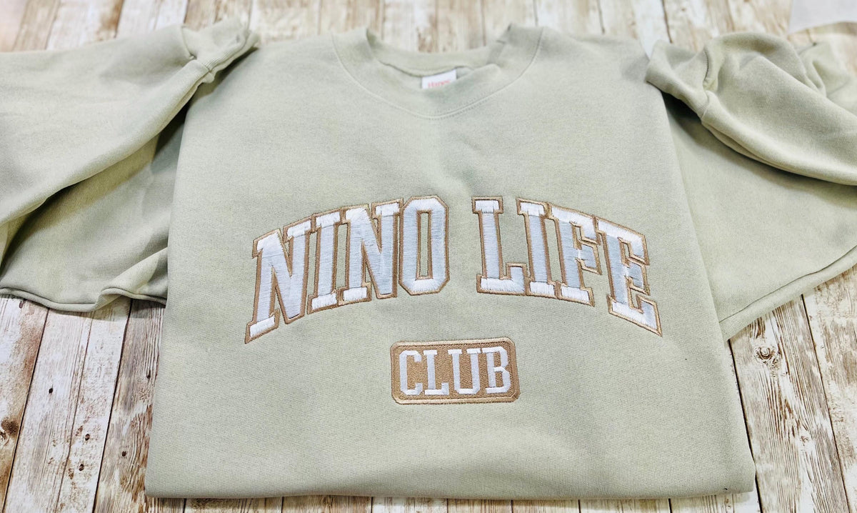 Nino! Nino Life Club embroidered soft and cozy sweatshirt. Perfect for your favorite Nino