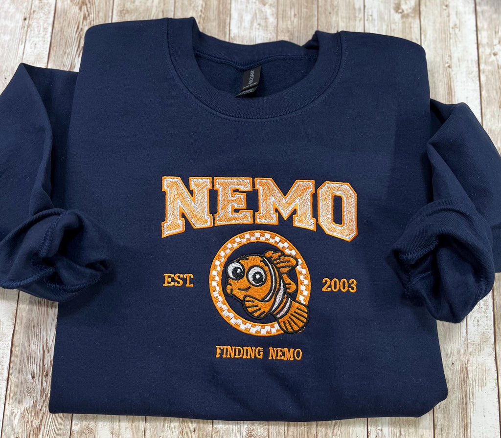 NEMO! Finding Nemo embroidered sweatshirt. For those Disney Nemo fans. This Vibrant sweatshirt is adorable.